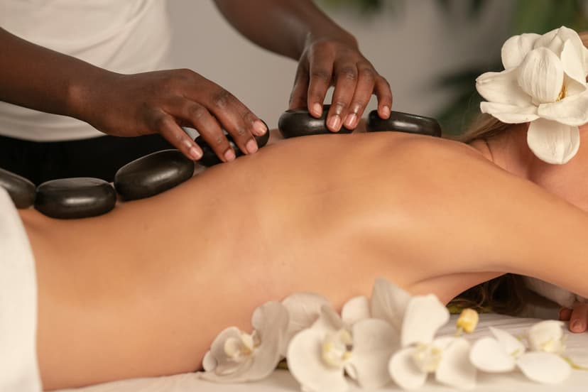 Massage therapist providing therapeutic treatment